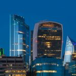 city skyline during night time